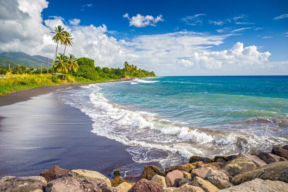 Black volcanic sand beach on the Nevis coast